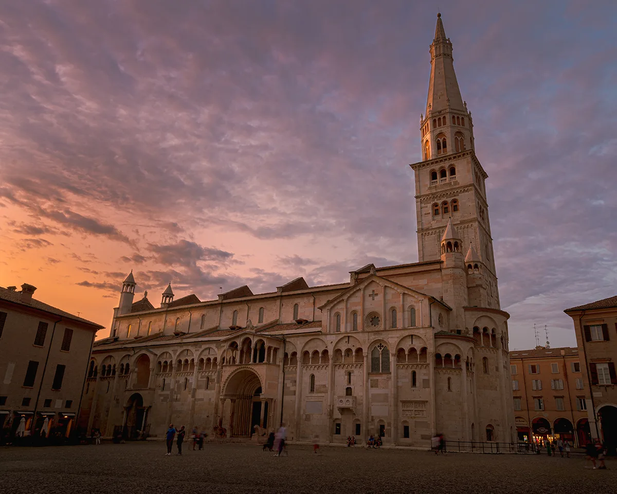 Modena's cathedral and the Ghirlandina tower at dusk