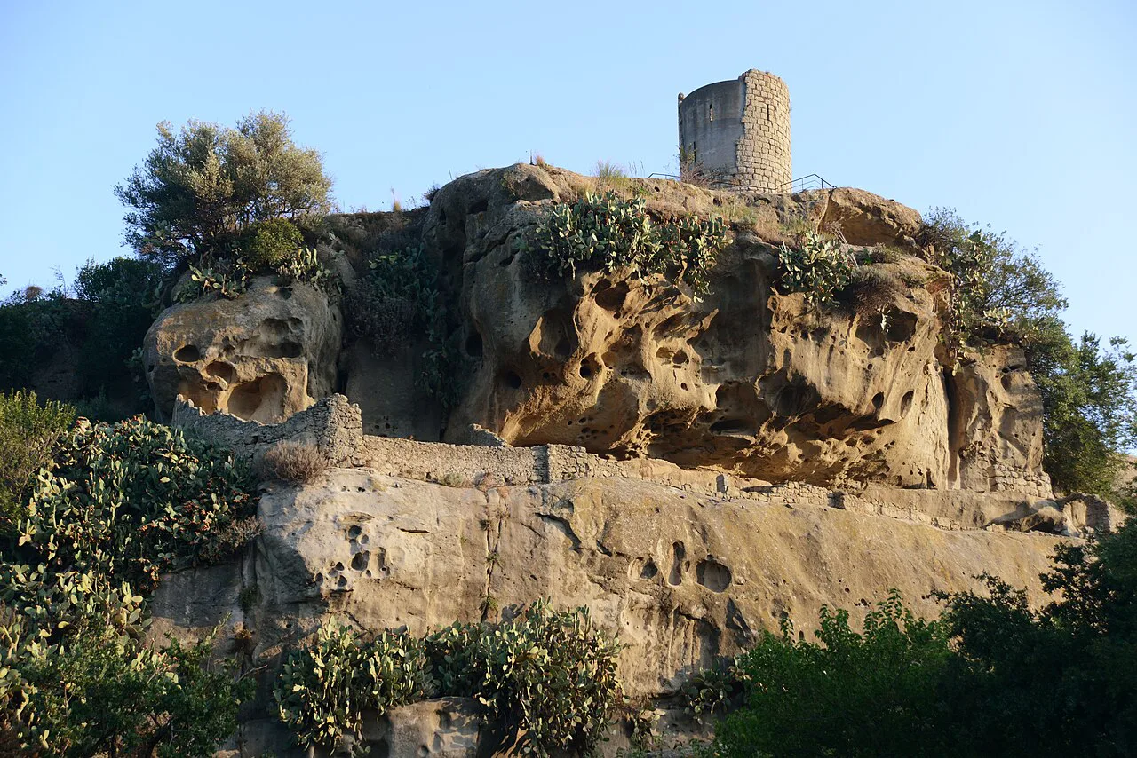 The U Cannizzu watchtower on its rock in Castiglione di Sicilia
