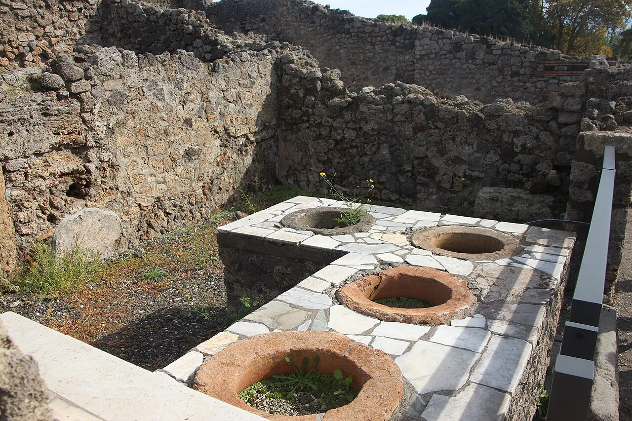 Counter of an ancient wine and olive shop in Pompeii
